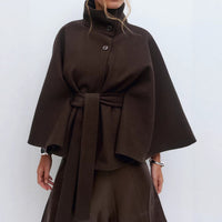 Trench Coat With A Stand-up Collar Buttons And A Belt