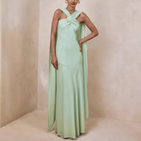 A Fashionable And Elegant Wrap-style Maxi Dress Adorned With Ribbon Details