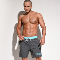 Men's Fashion Casual Solid Color Soakable Five-point Swimming Trunks