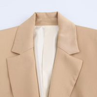 The Casual Long-sleeve Blazer Is Made From A Silk-like Satin Fabric