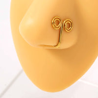 Fake Piercing Nose Nails Are Exaggerated And Hand-wound To Avoid Perforation