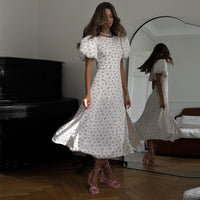 French-style Crewneck Floral Dress With Puff Sleeves And A Backless Design