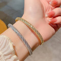 Diamond-encrusted Rhombus Bangle Smooth Surface Crisscross Design