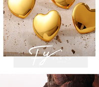European And American Minimalist Glossy Heart-shaped Stainless Steel Earrings For Women. Light Luxury Minimalist Style. Exaggerated Heart-shaped Earrings. Versatile Accessories.