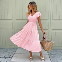 Pink Midi Dress With Ruffled Sleeves And A Tiered Hem