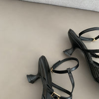 Empty Sandals Behind Women's Baotou