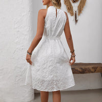 Elegant White Embroidered High-waisted Halter Dress With A Cinched Waist