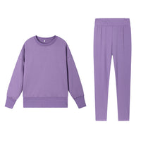 Casual Relaxed Fit Long Sleeve Crew Neck Top With Side Slits Paired With Matching Sweatpants