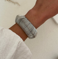 Bold Exaggerated C-shaped Alloy Bracelet With A Brushed Finish