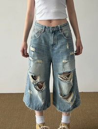Retro Worn Looking Washed-out Ripped Cat Beard Denim Shorts